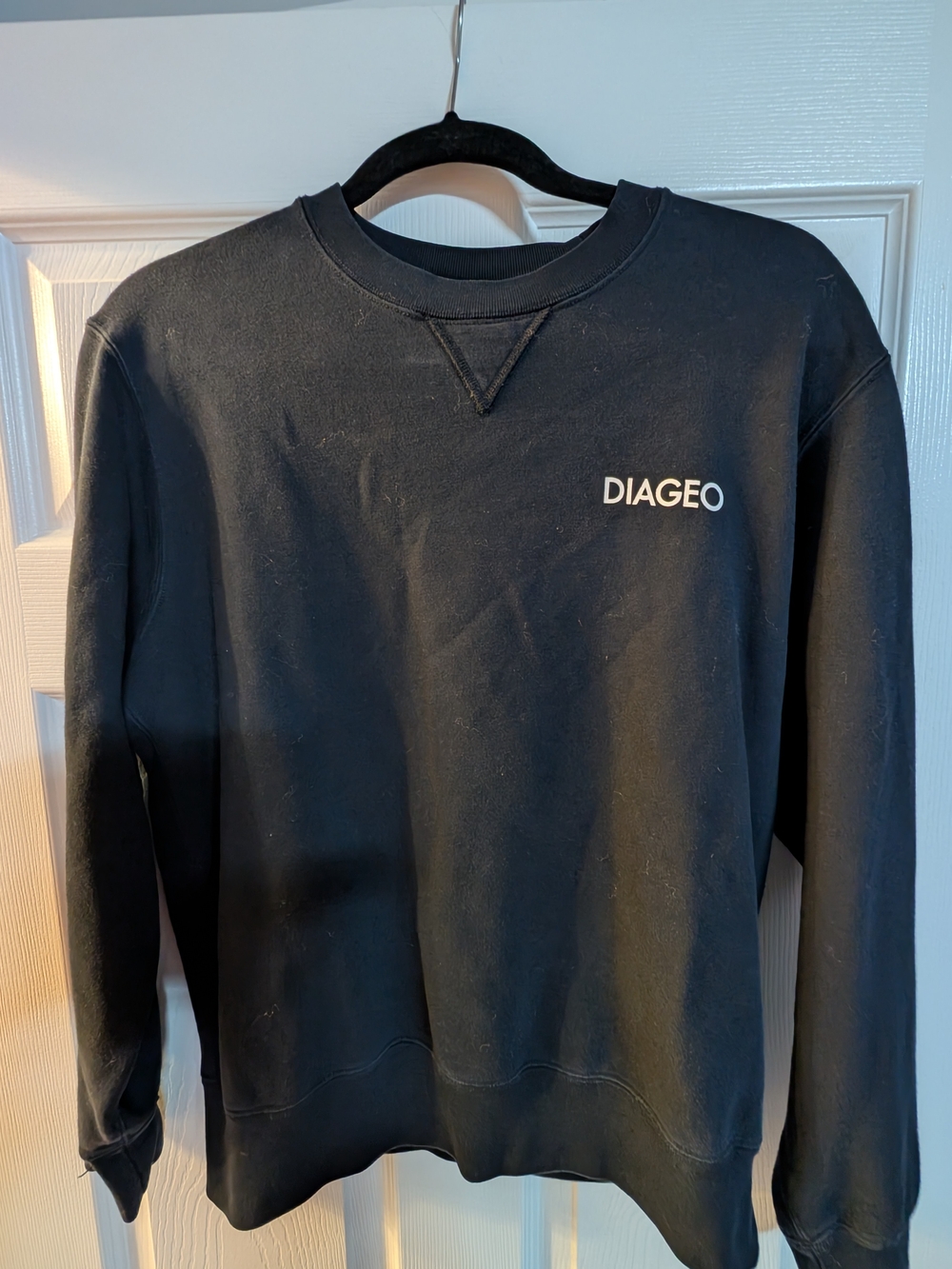 Uniqlo Black Crewneck Sweatshirt with White DIAGEO Logo